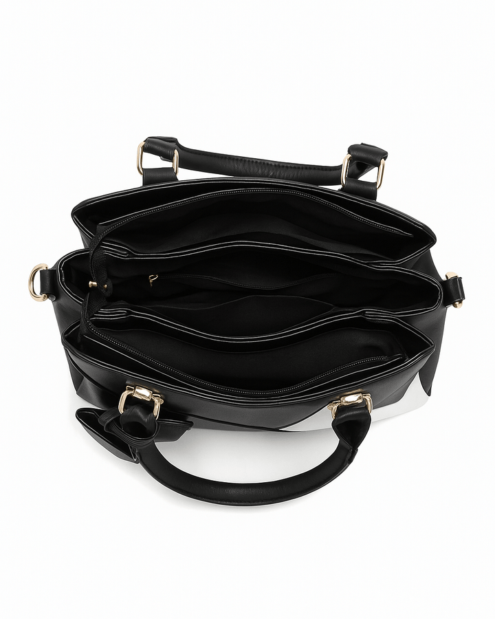 Interior view of LuLu 60s Mod Handbag showcasing three spacious compartments and stylish black lining.