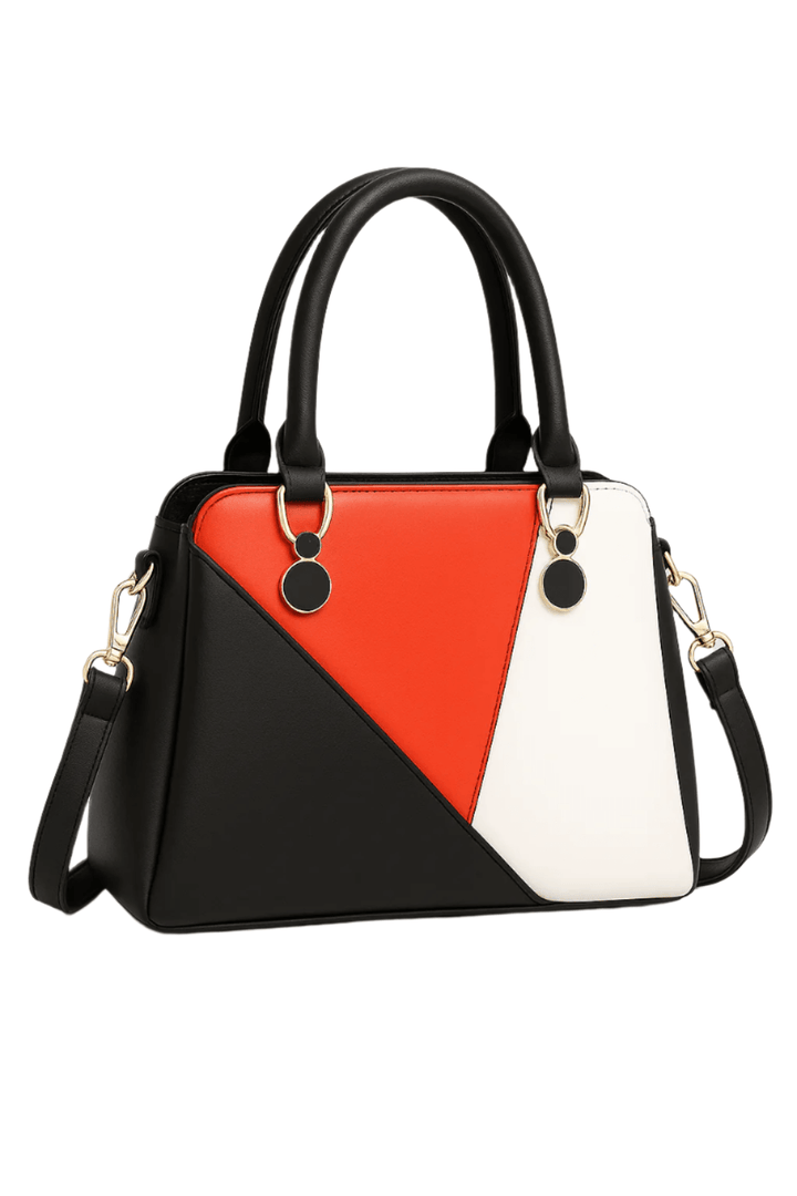 LuLu 60s Mod Handbag in bold red, black, and white geometric patchwork design, perfect for retro style.