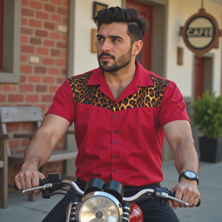 Man wearing a mens vintage style red bowling shirt with leopard trim while riding a scooter outdoors.