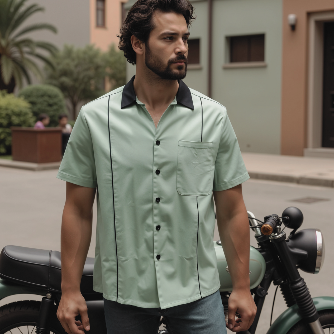 Mint green vintage bowling shirt with black collar and piping, perfect for retro style and dance.