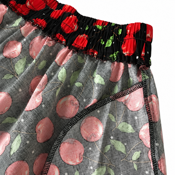 Close-up of the stretchy elastic waistband on the red cherry swing skirt