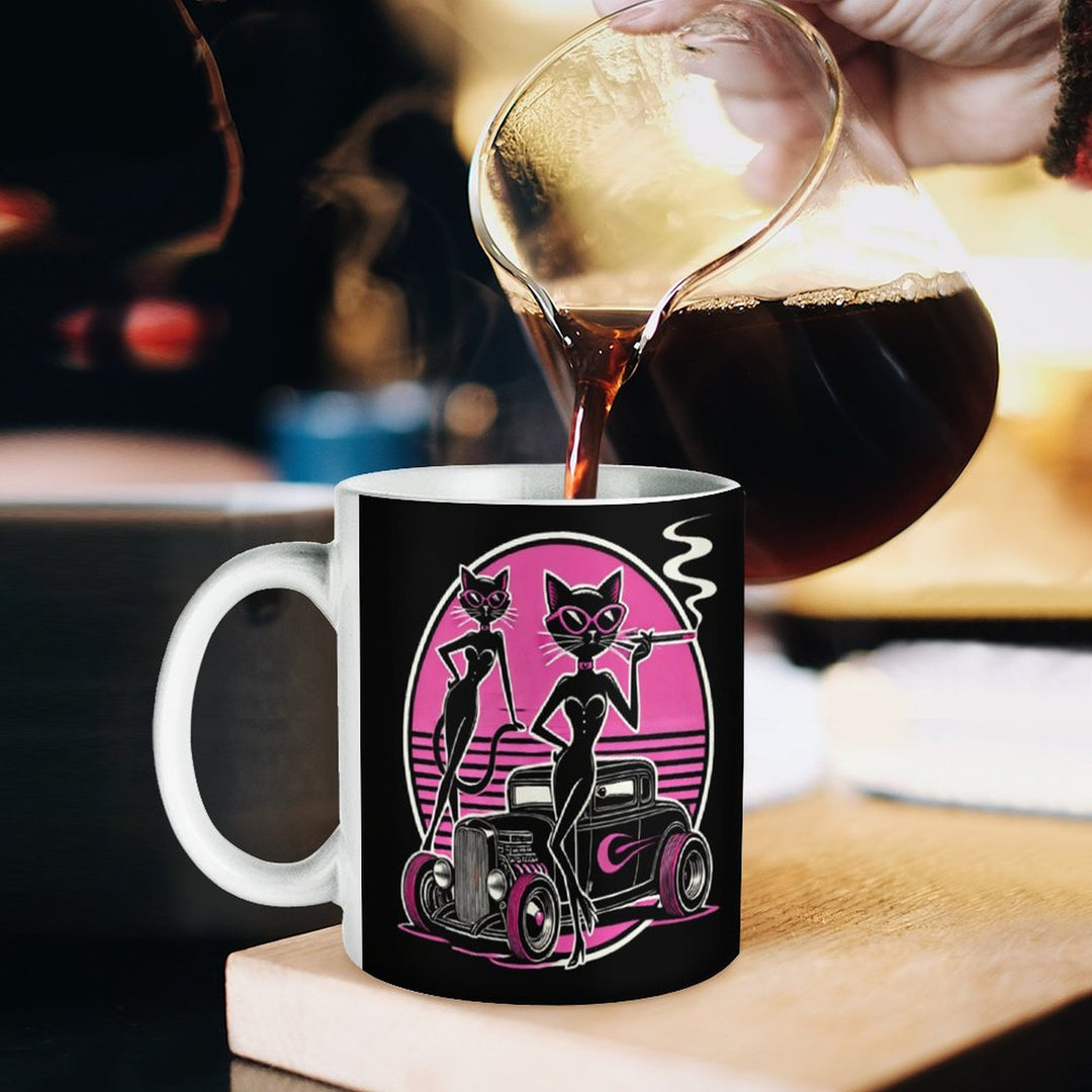 Retro coffee mug with stylish cat graphic being filled with coffee, perfect for enjoying your favorite brew.