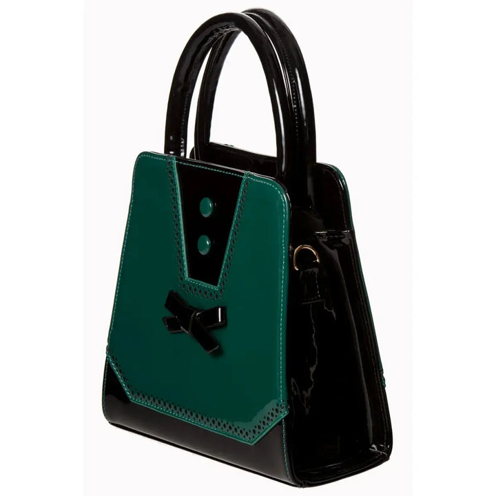 Rosemary's Bag teal handbag with glossy patent finish, bow detail, and adjustable shoulder strap.