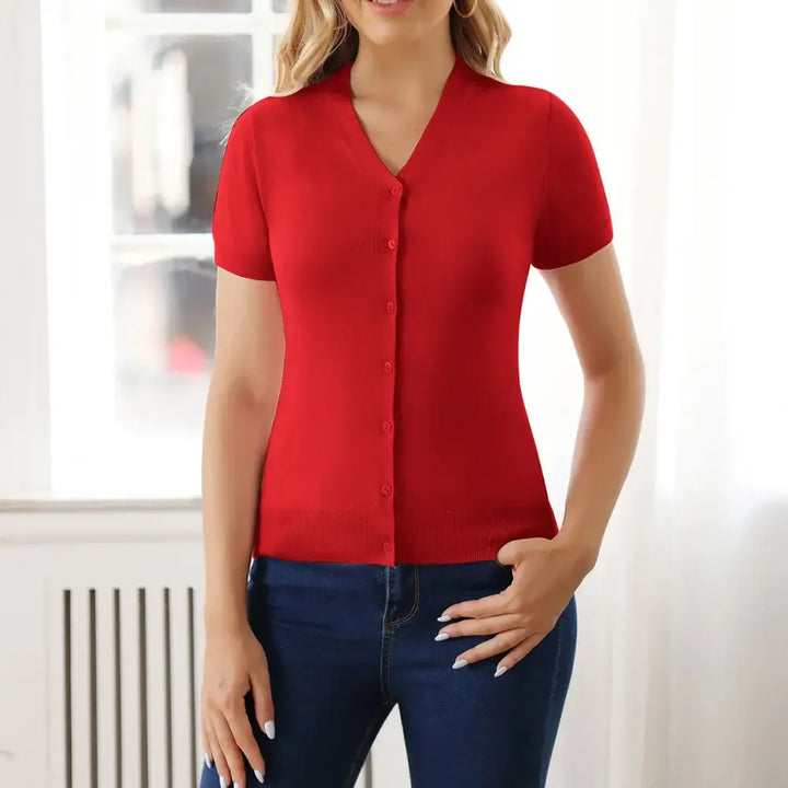 Red short sleeve V-neck button-up cardigan worn with jeans, showcasing its lightweight and flattering fit.