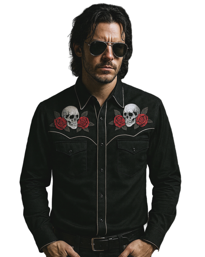 Man wearing a black shirt with skull and rose designs on a white background