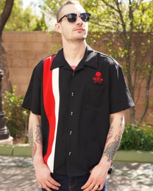 Model wearing the black, red and white Steady Clothing Skull Piston Racer bowling shirt