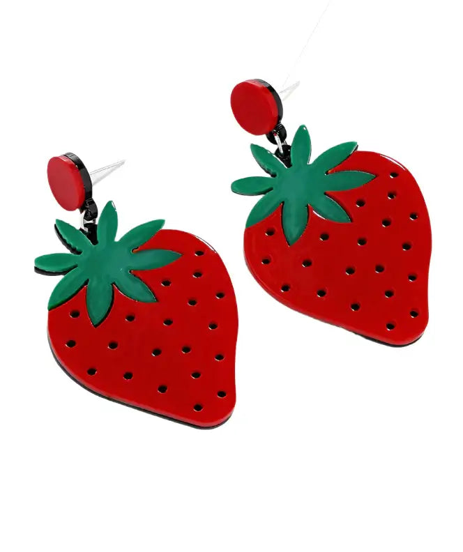 Acrylic strawberry drop earrings with green leaves and red studs, featuring a fun pinup style.
