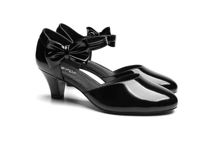 Stylish black SugarPOP DragonGlass v2 shoes with a bow design and a sleek heel.