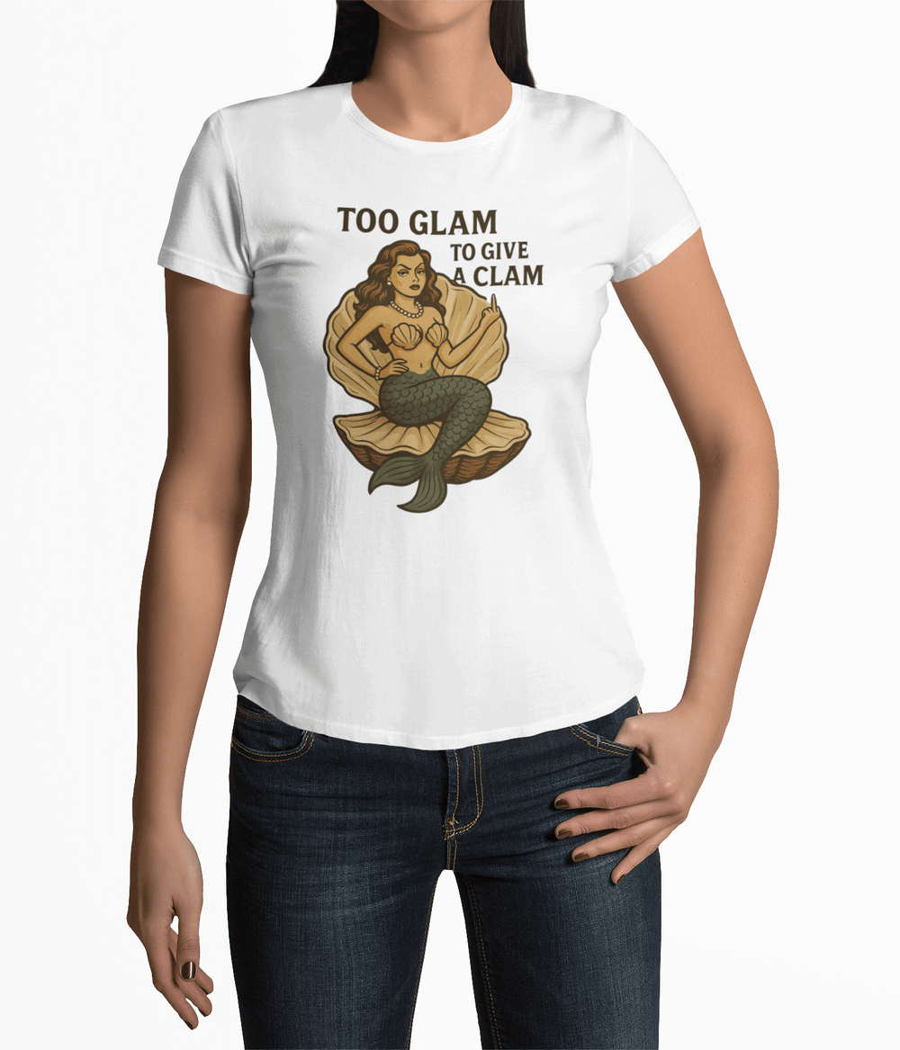 White women's tee with 'Too Glam to Give a Clam' and retro mermaid design, perfect for beach lovers.