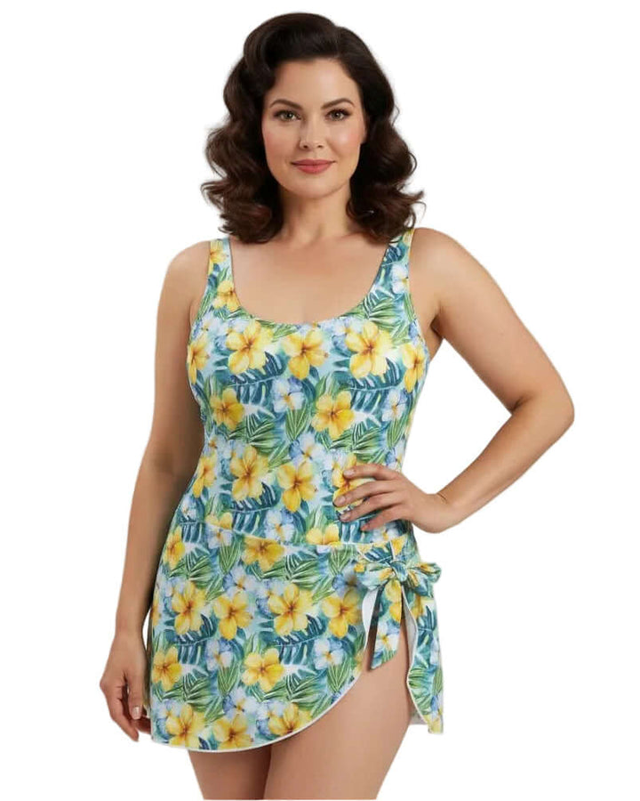 Tropical Hibiscus One Piece Skirted Swimsuit showcasing a vibrant floral print and feminine tie-side skirt.