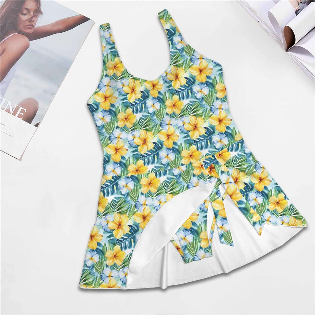 Tropical Hibiscus One Piece Skirted Swimsuit with vibrant floral print and feminine tie-side skirt.