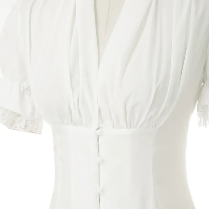 Victorian Ruffle Lace Puff Sleeve Blouse featuring delicate puff sleeves and button-front design.
