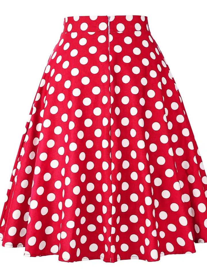 Red polka dot flared skirt featuring a vintage A-line silhouette, perfect for a playful, stylish wardrobe.